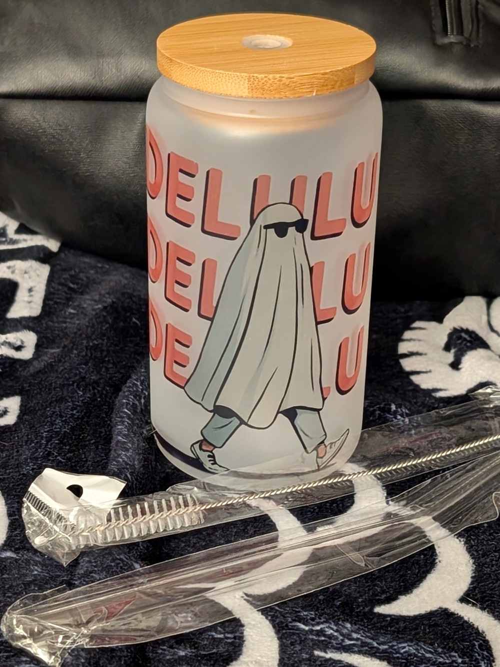 Frosted Glass Water Bottle with Bamboo Lid — Ghost Graphic, Coral Text